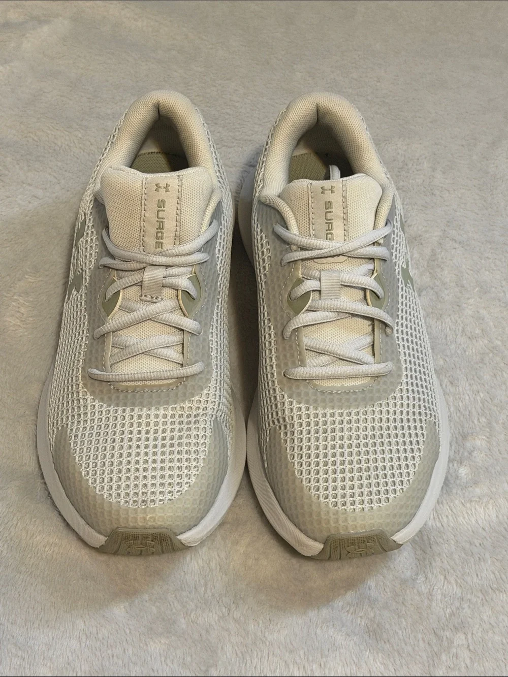 Under Armour woman’s Surge Running Sneakers — Light gray
